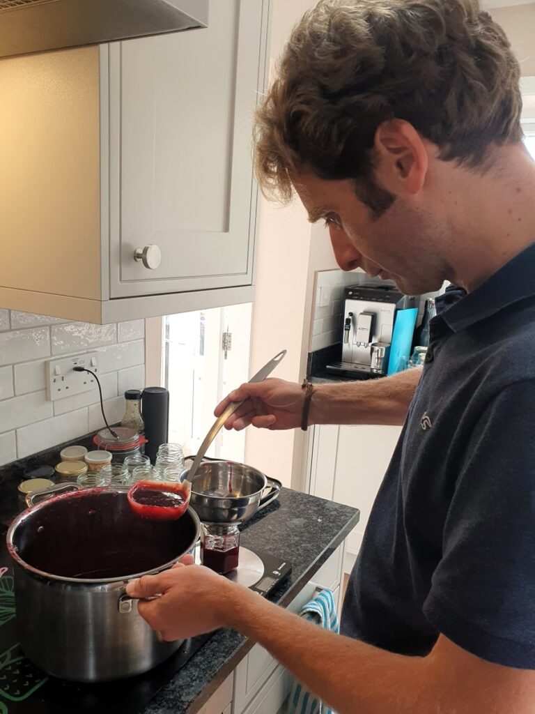 Tristran jarring up a test batch of Blackberry & Apple Jelly with Honey.